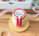 白い月色プリンの瓶1個。赤いラベルに「ミルキーな味わい」「酪王牛乳使用」とある